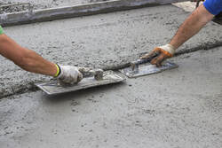 concrete contractor doing concrete refinishing 